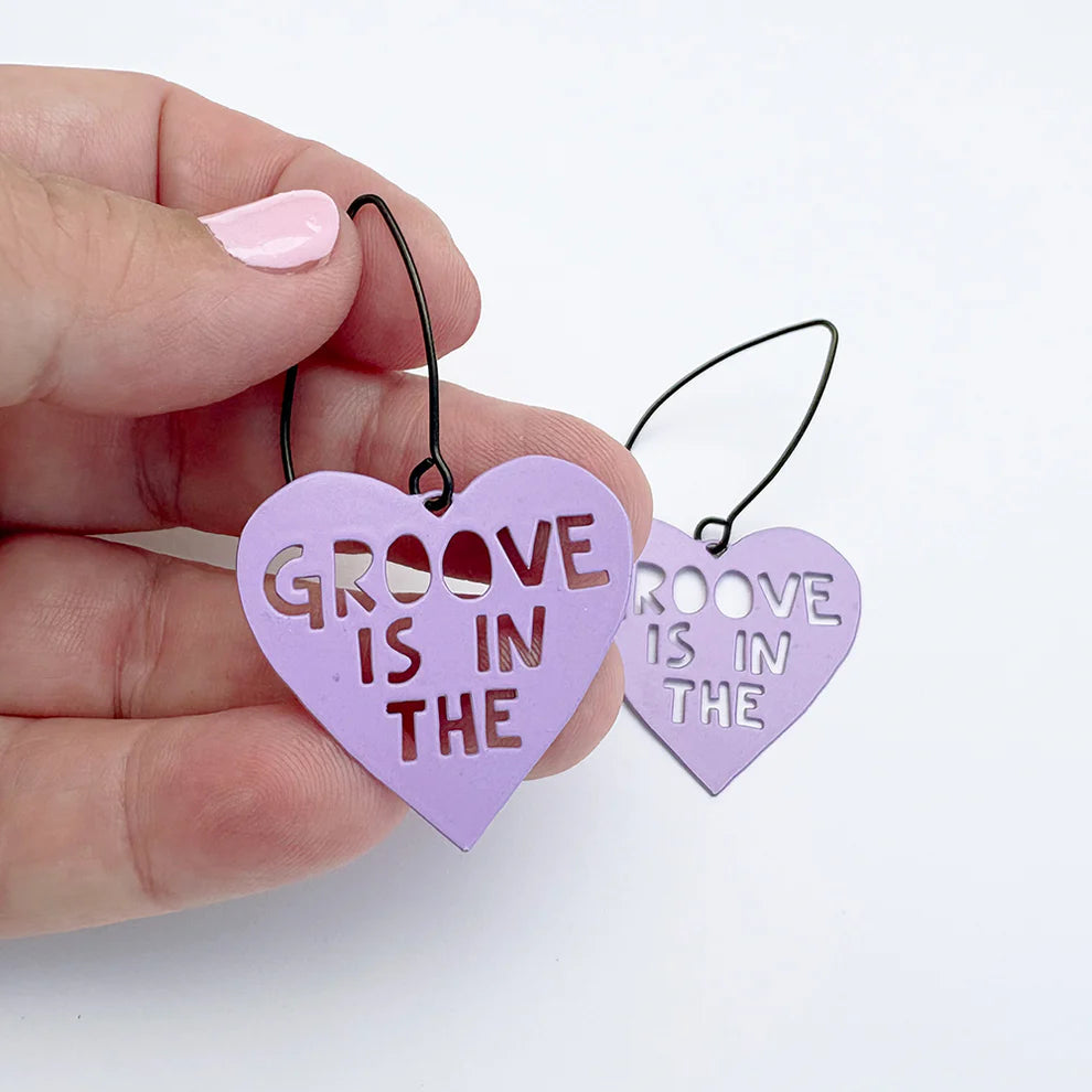 Mini Groove is in the Heart earrings in Purple | Denzandco